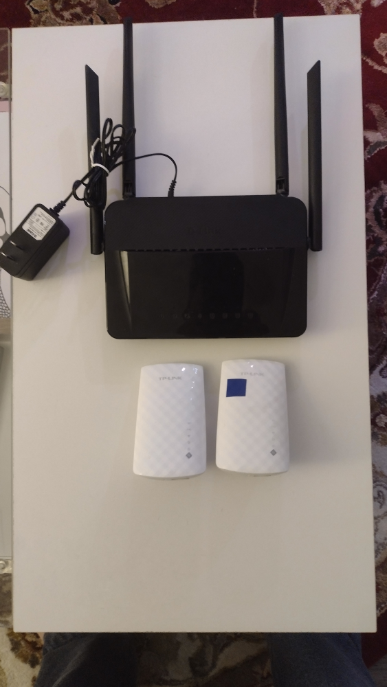 TP-LINK  router and 2 extenders thumbnail