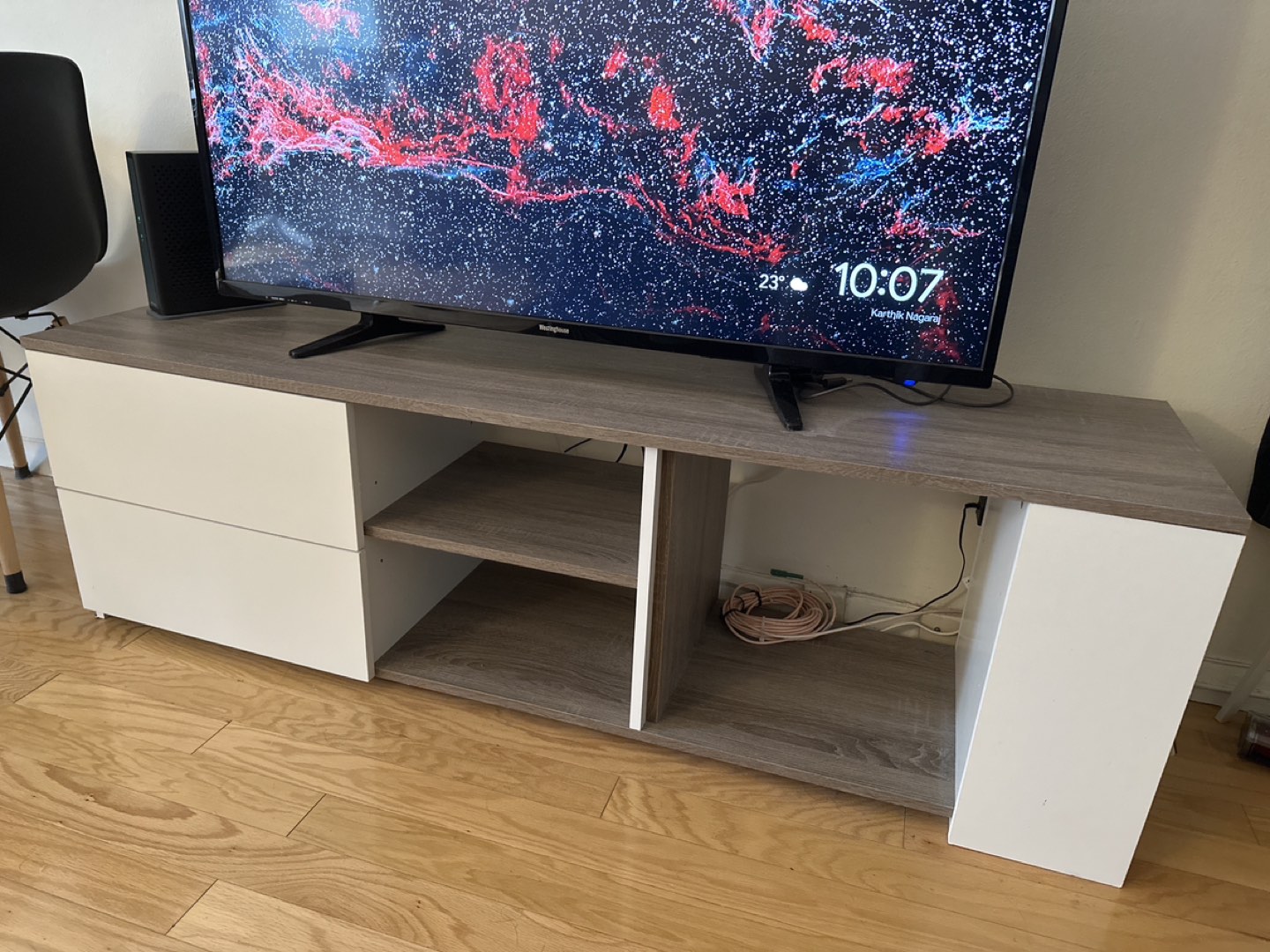 Selling TV stand with small drawers and shelving at the side