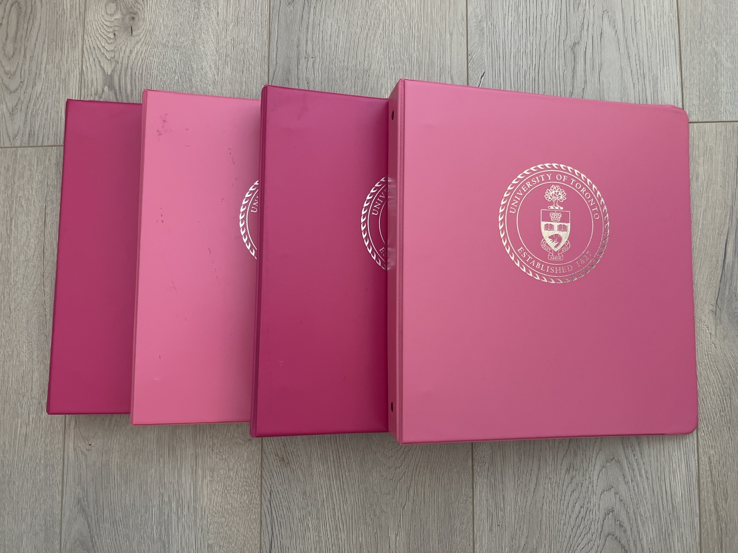 Four pink UofT 3-ring binders #freecycle