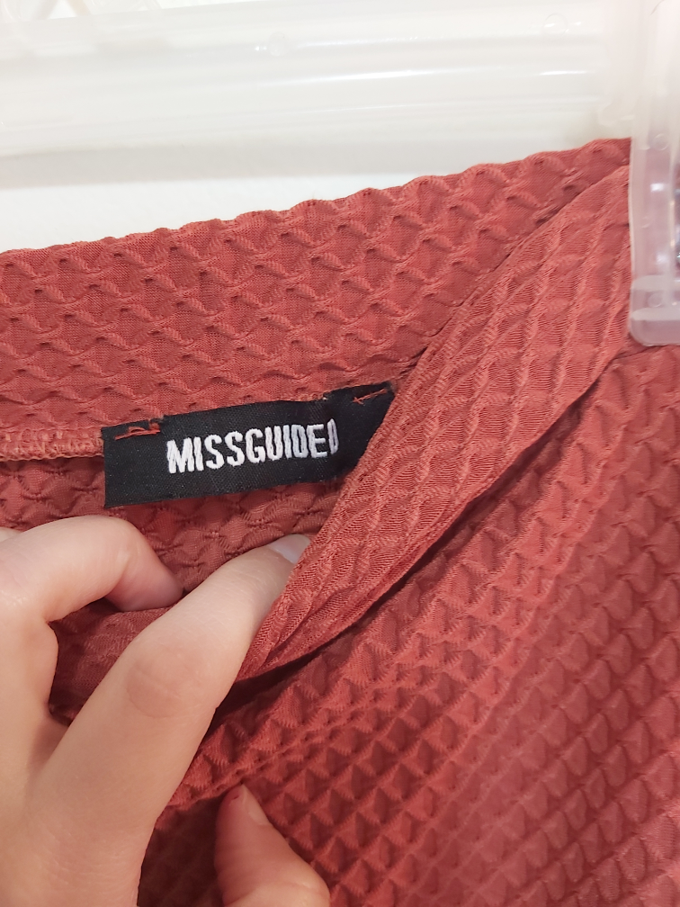 MISSGUIDED burnt orange textured skirt, size M/L image indicator(6)