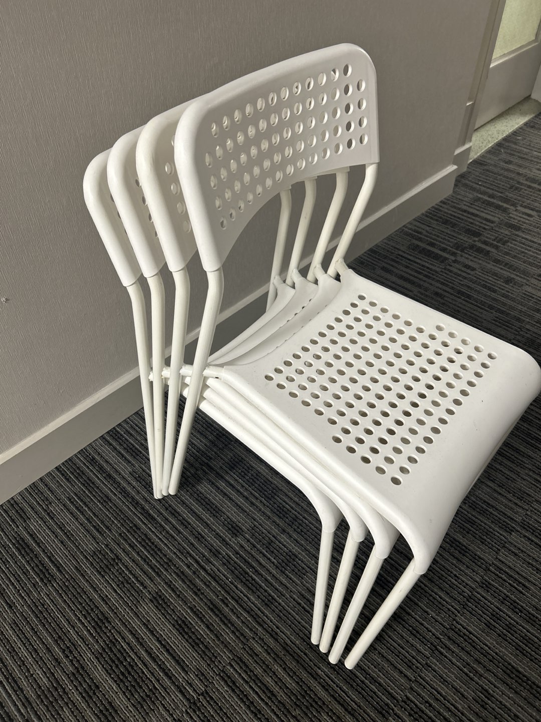 Ikea white stackable chairs (4pcs) - pending thumbnail