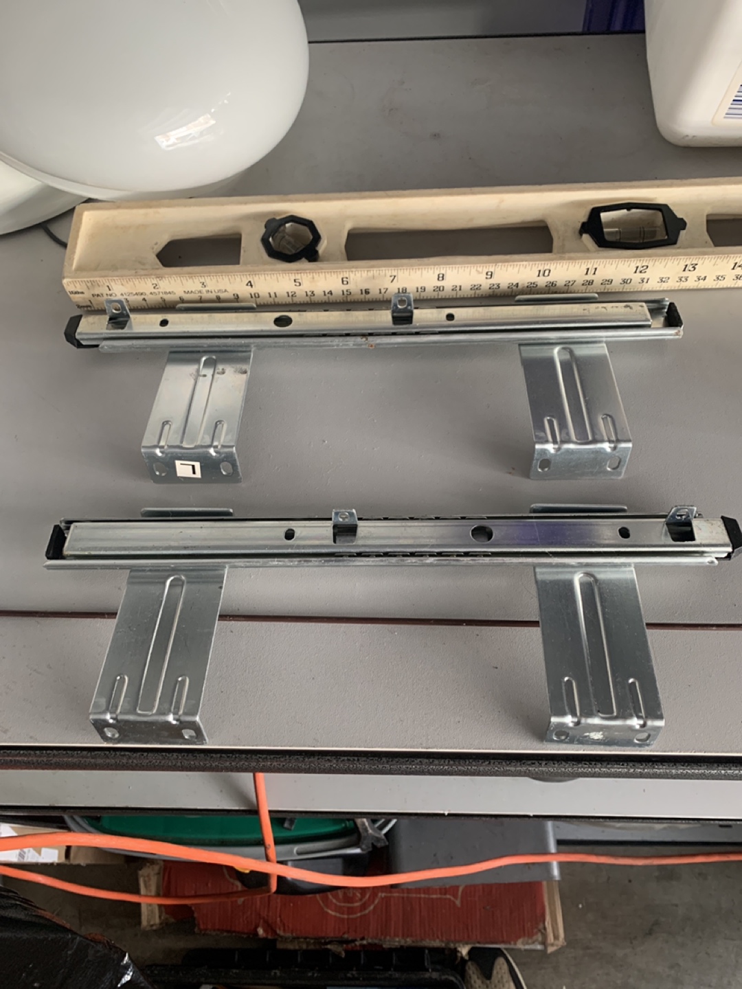 Under table sliding draw rail