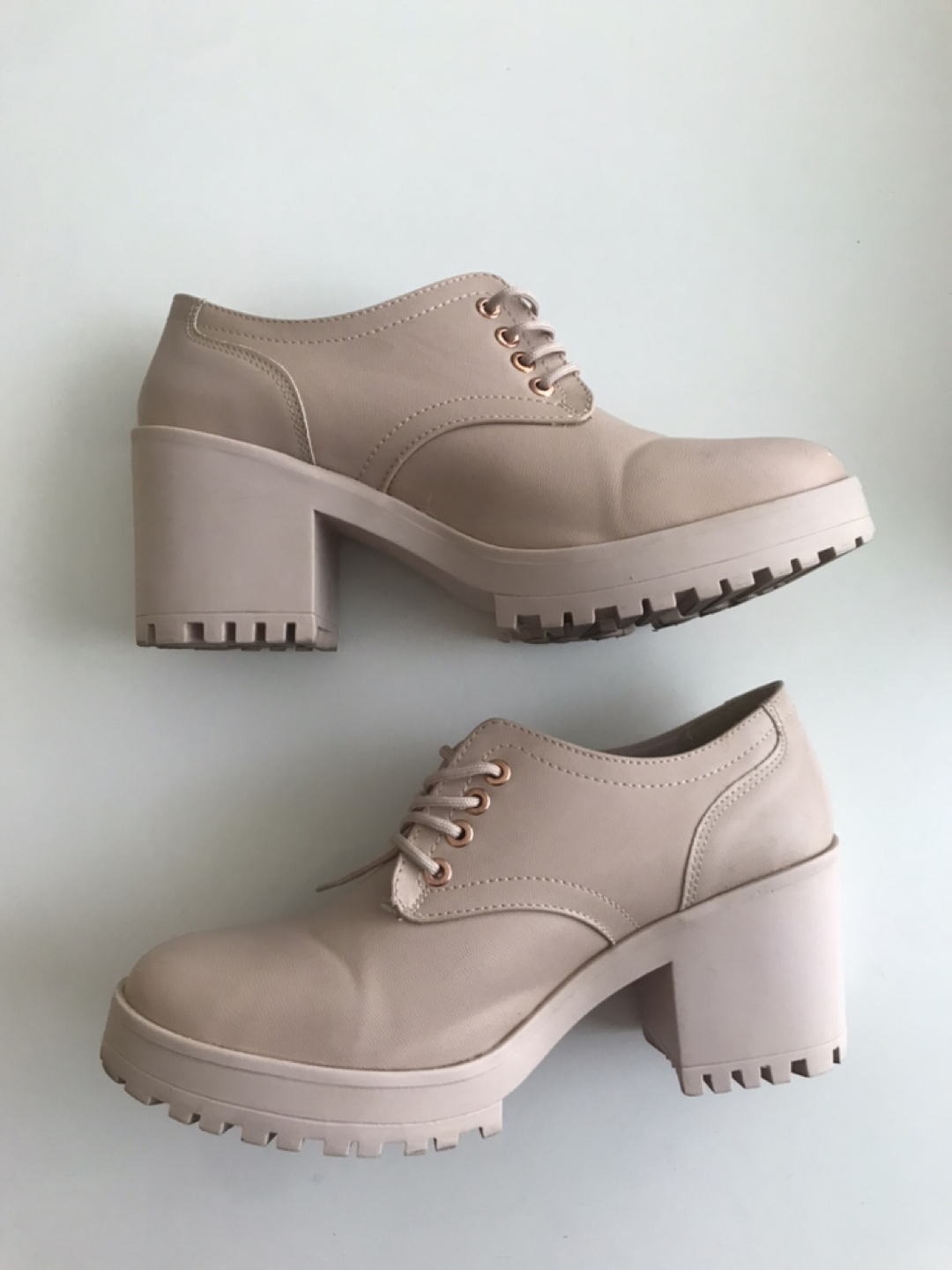 Pink chunky heeled lace-up boots