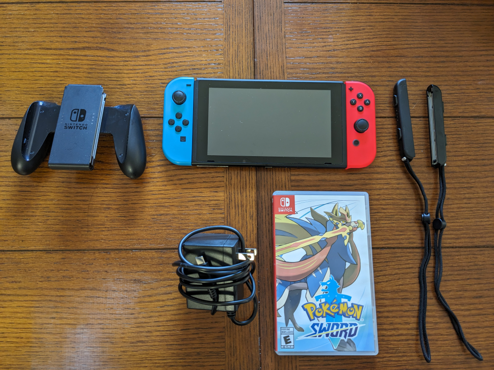 Nintendo Switch (accessories + game)