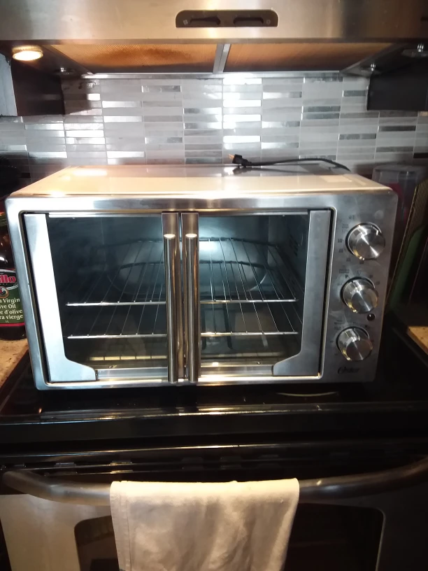 Oster French door oven with convection stainless steel