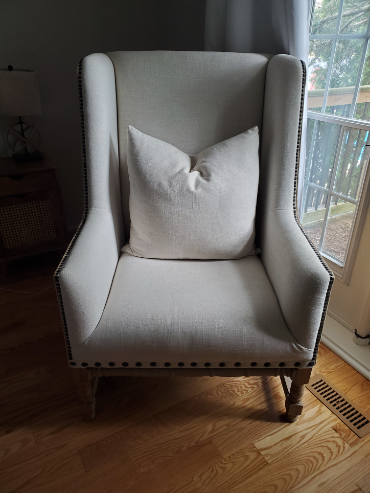 Beige armchair with cushion thumbnail