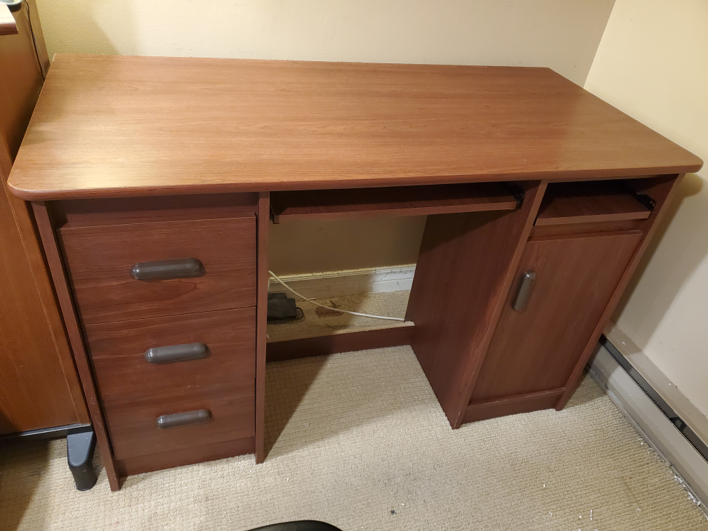 Office desk with keyboard/side table. Hutch is available 