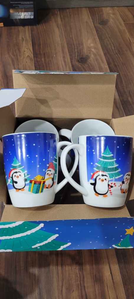 Brand new Set of 4 Christmas penguin porcelain mugs