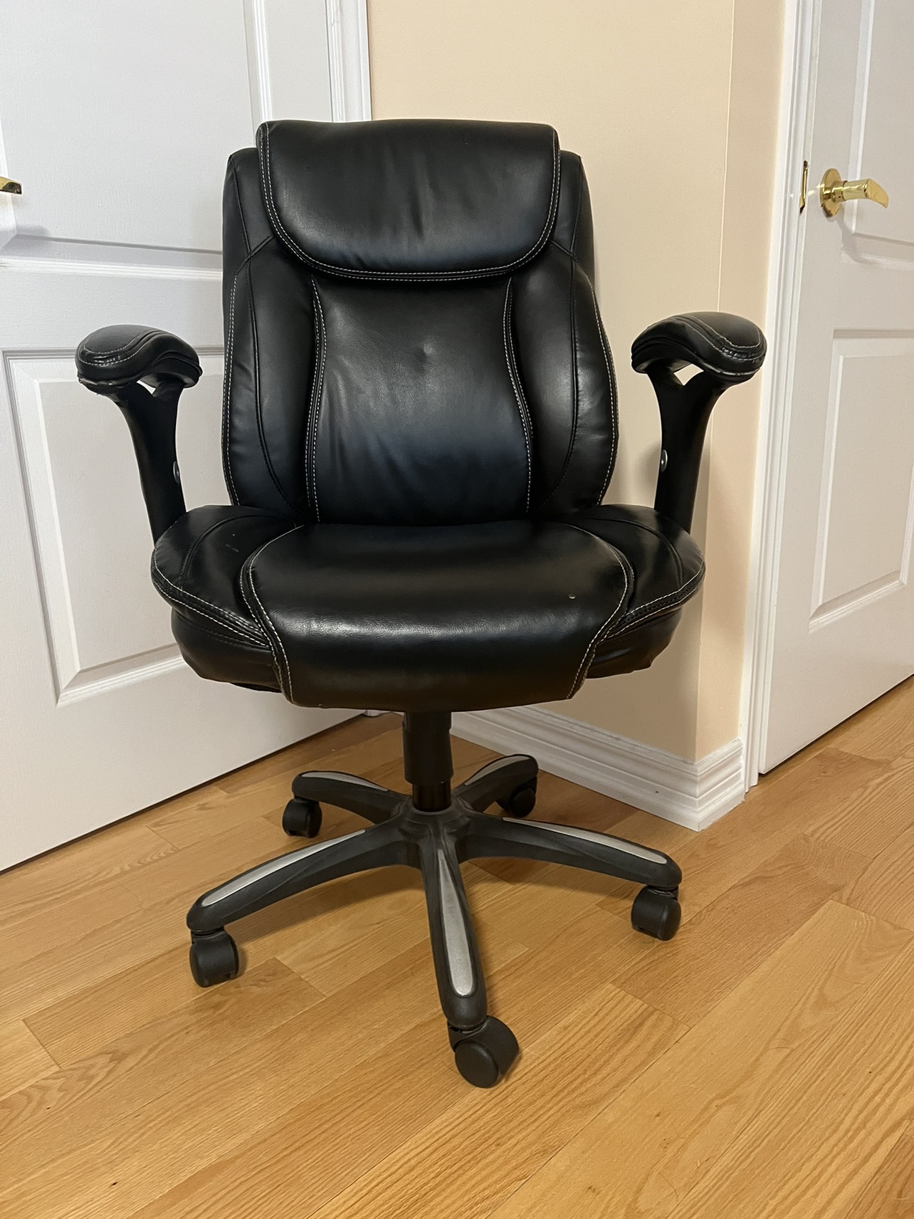 Revolving office chair