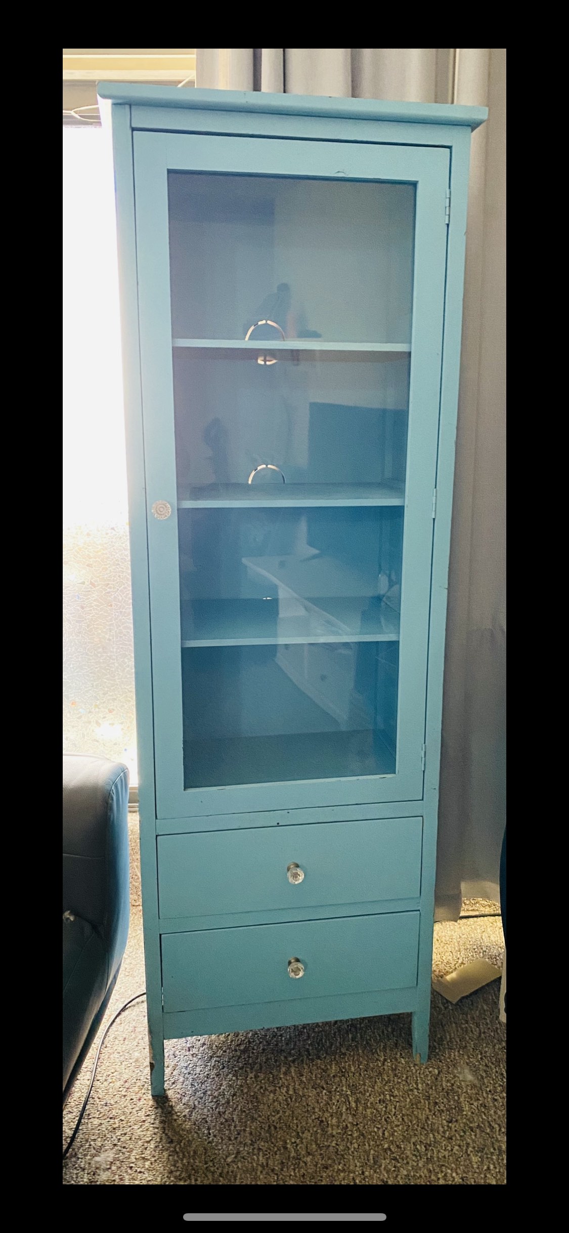 Turquoise cabinet with “crystal” looking knobs