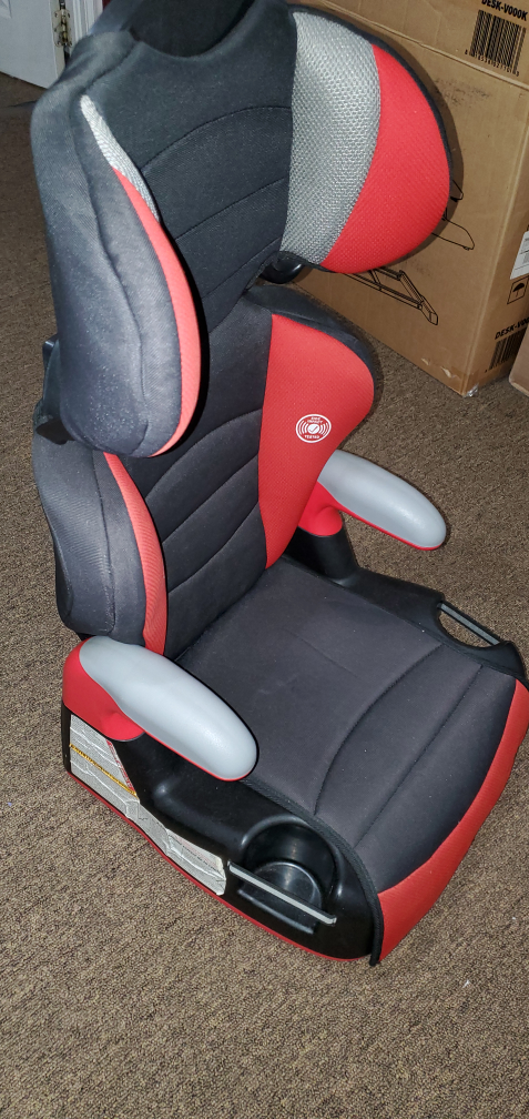"Evenflo" child car booster seat.