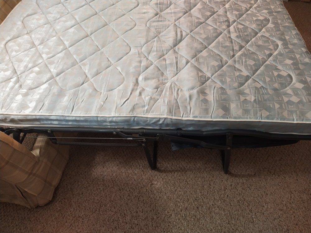 Anyone interested in an old sofa chair that opens into a bed? image indicator(6)