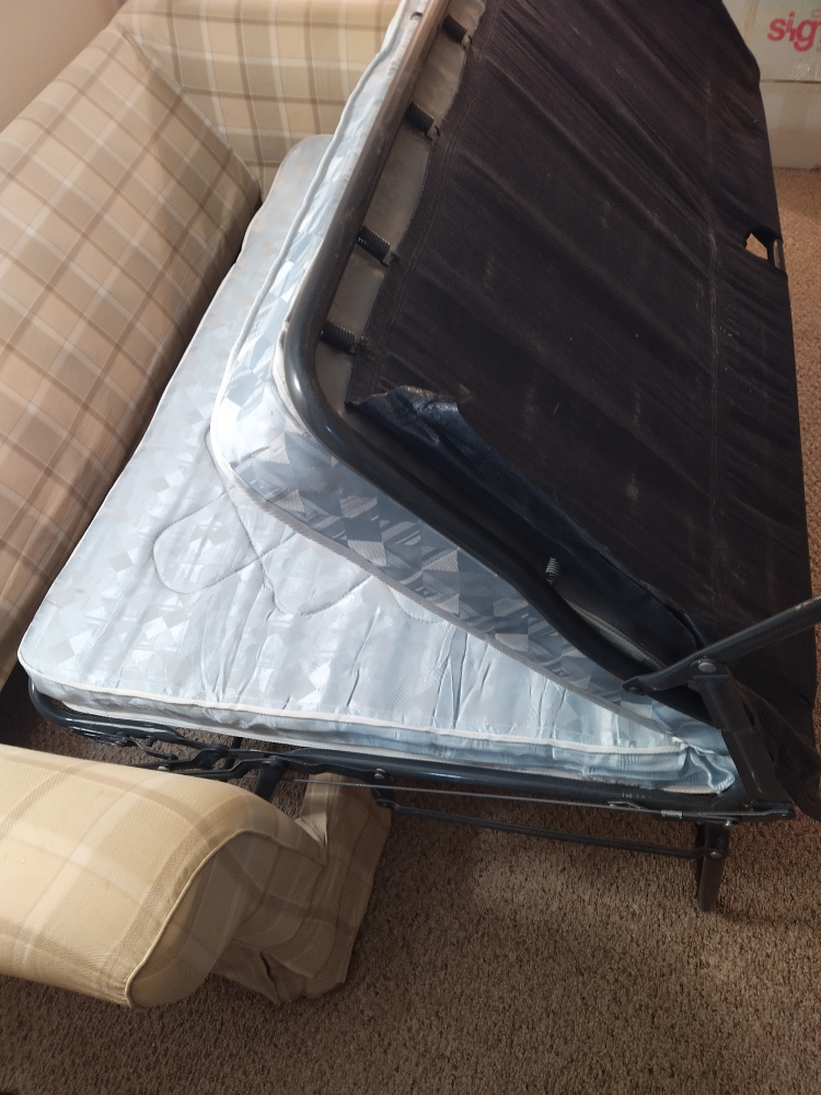 Anyone interested in an old sofa chair that opens into a bed? image indicator(7)