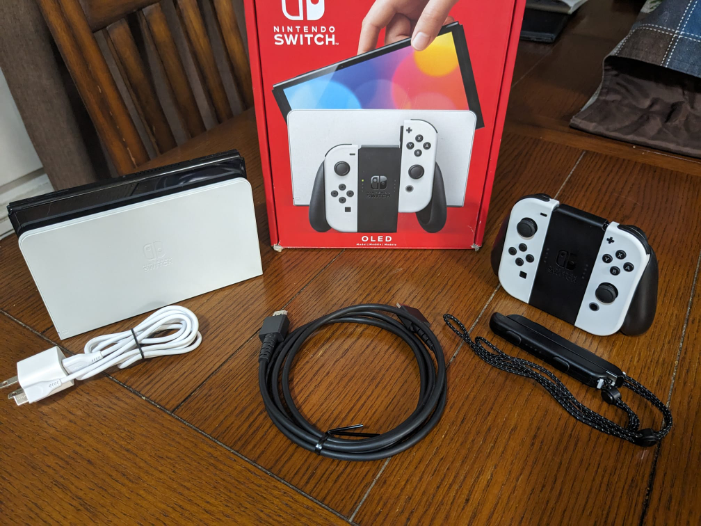 Nintendo Switch OLED + accessories