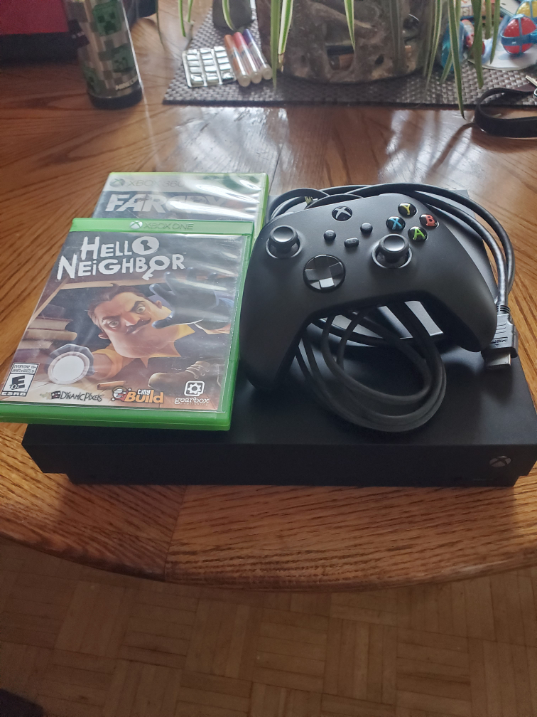 Xbox One X 1 Tb + Controller + 2 Games thumbnail