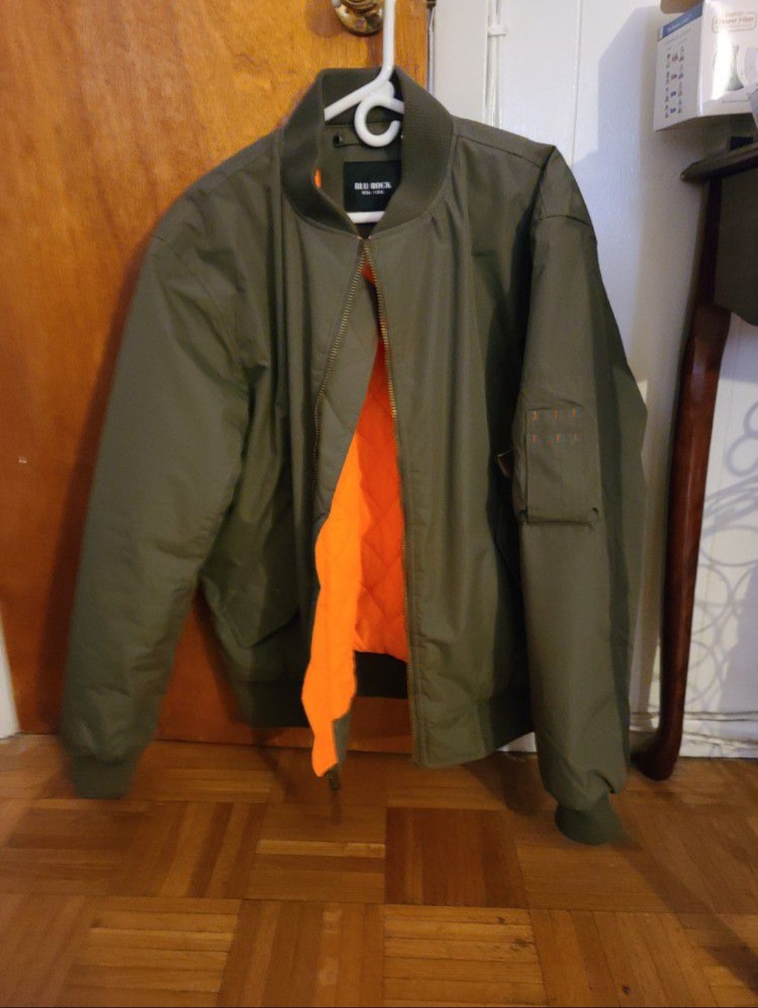 green bomber jacket