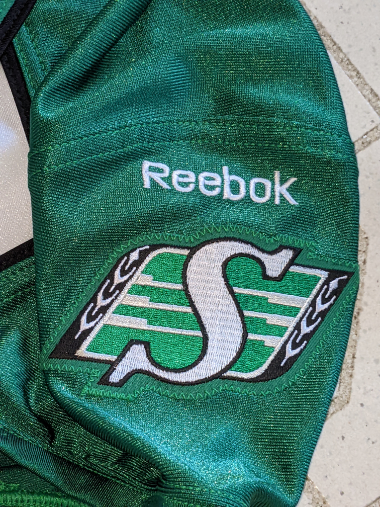 LIKE NEW SIZE 46 LARGE SASKATCHEWAN ROUGHRIDERS jersey image indicator(3)