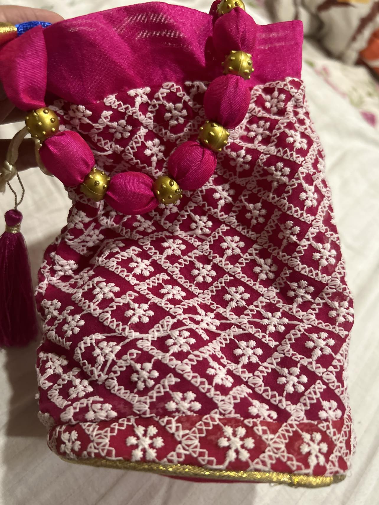 hand potli bag thumbnail