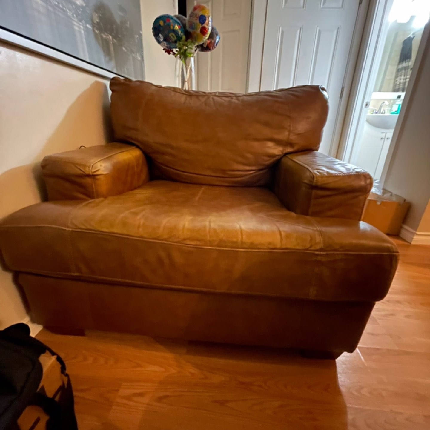Brown leather armchair