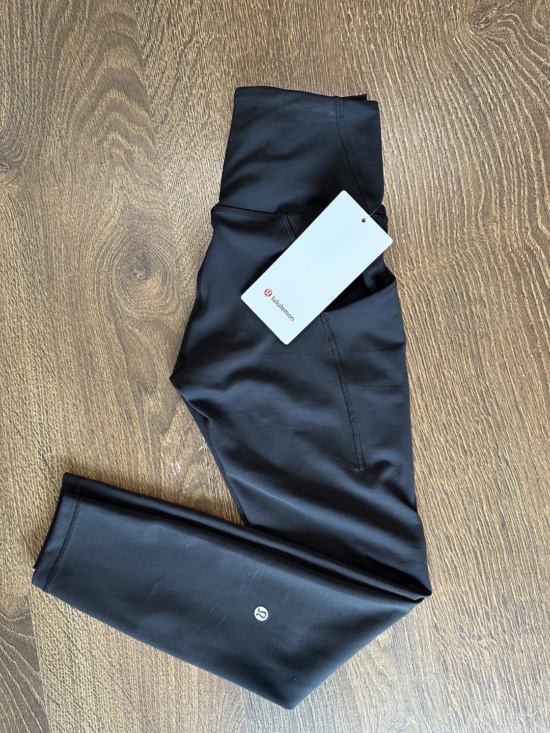 Lululemon Wunder Train High-Rise Tights with Pockets 25”, Size 4