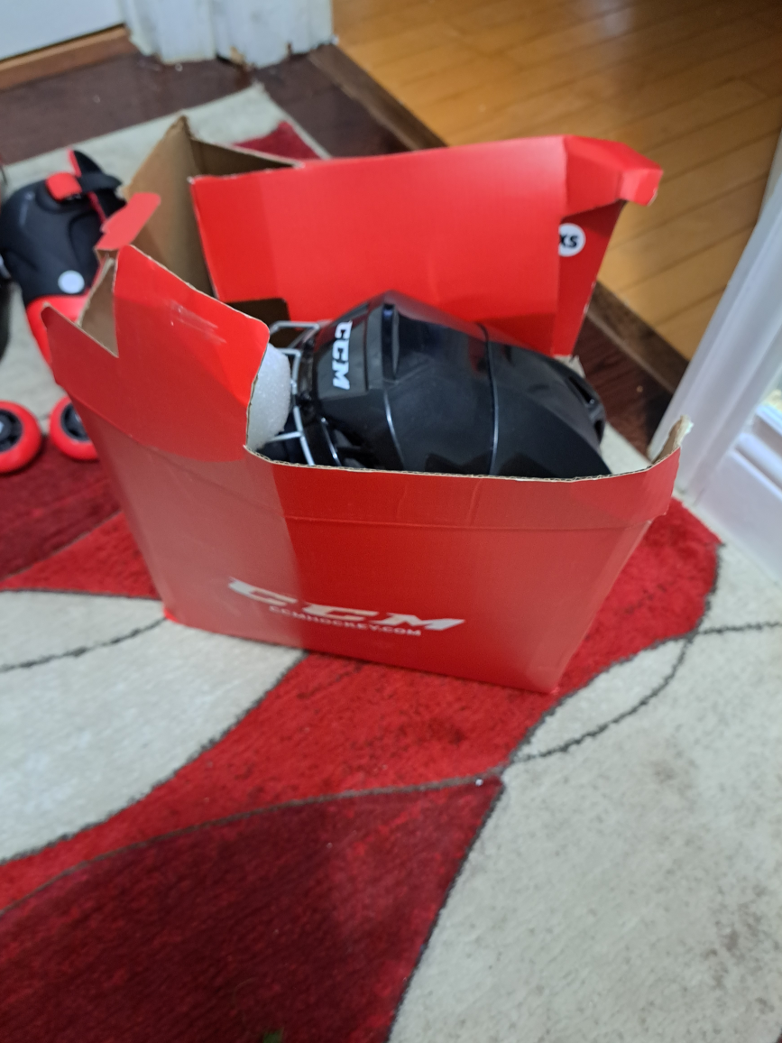 2 hockey helmets thumbnail