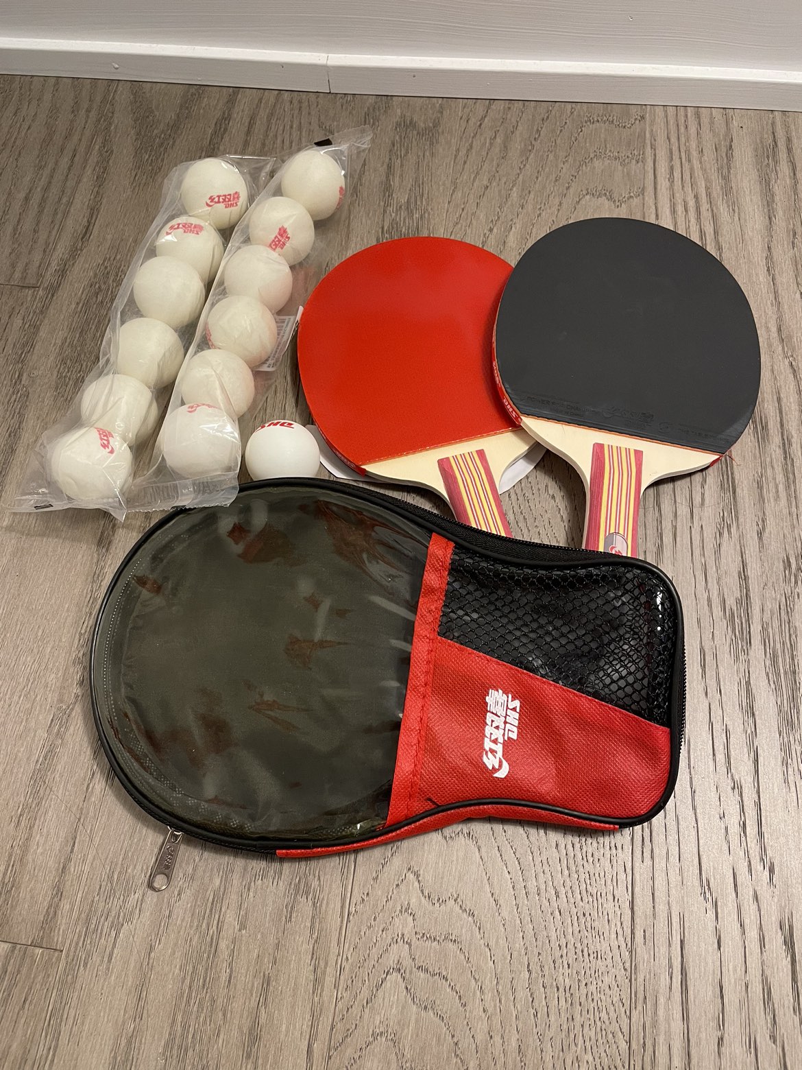 Ping pong racket, case, and balls image indicator(2)