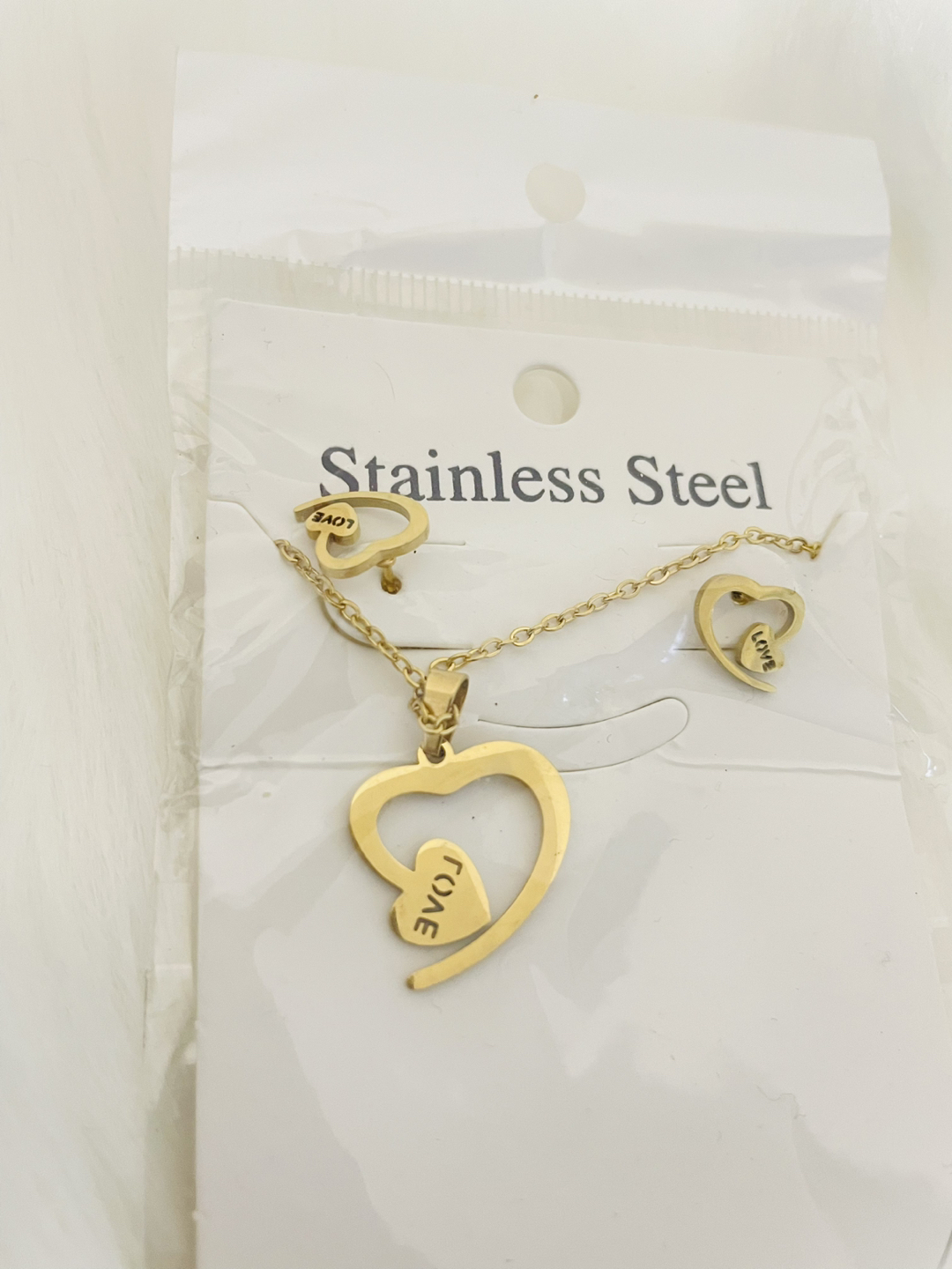 Heart shaped love pendant and earrings