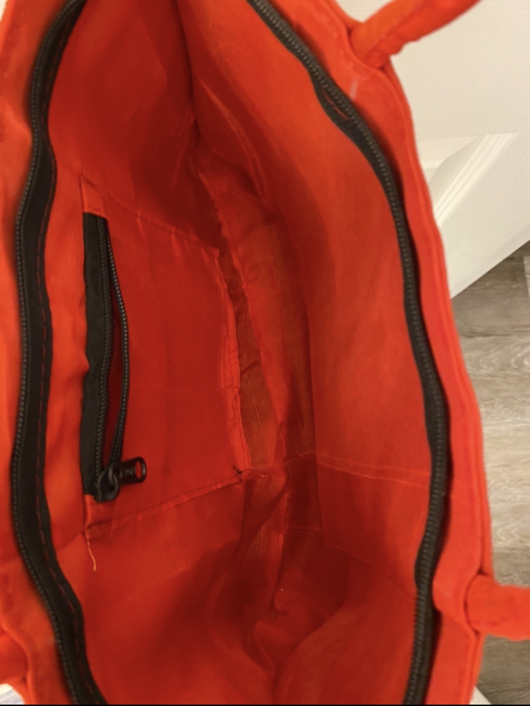 Red bag with peacock design image indicator(3)