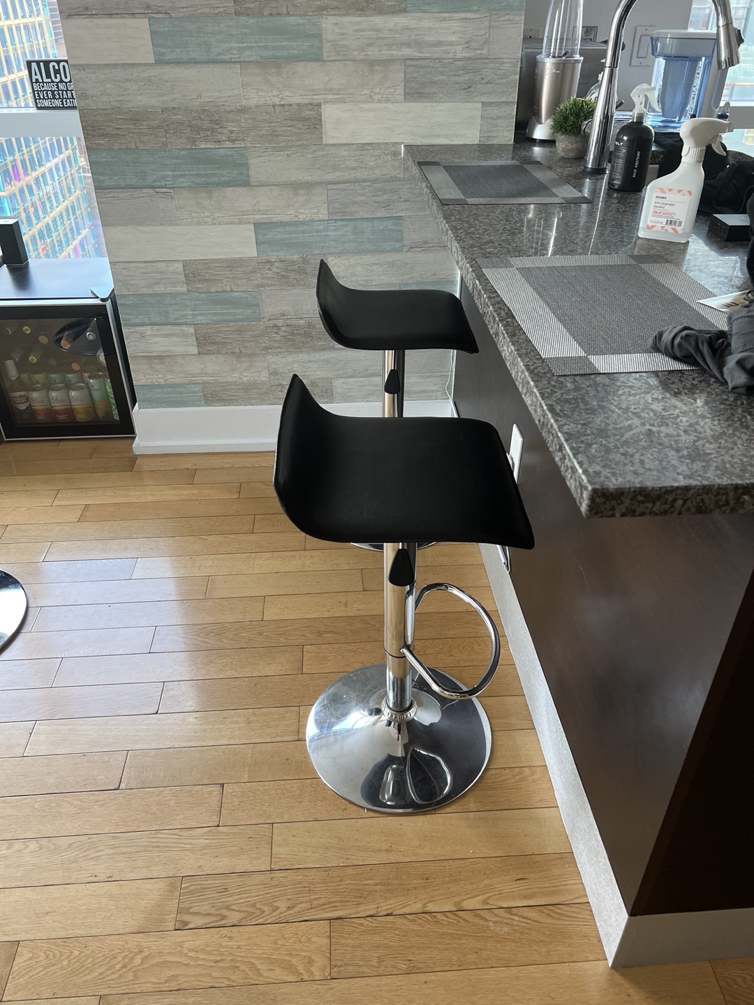 Two Adjustable-Height Black Barstools