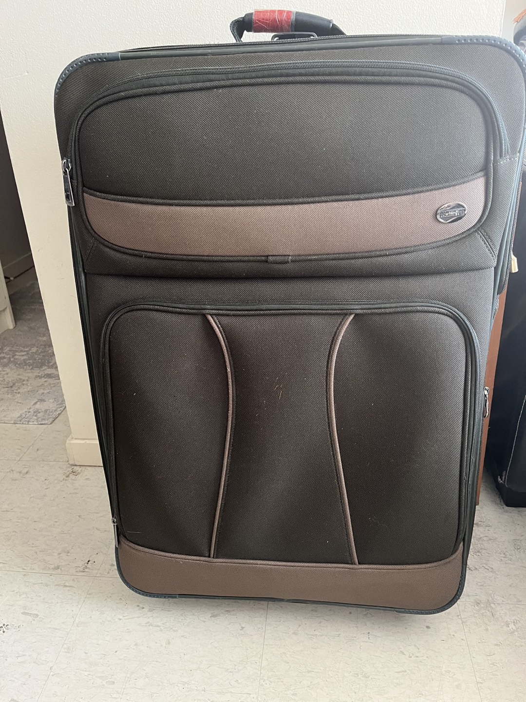 American tourister check in luggage