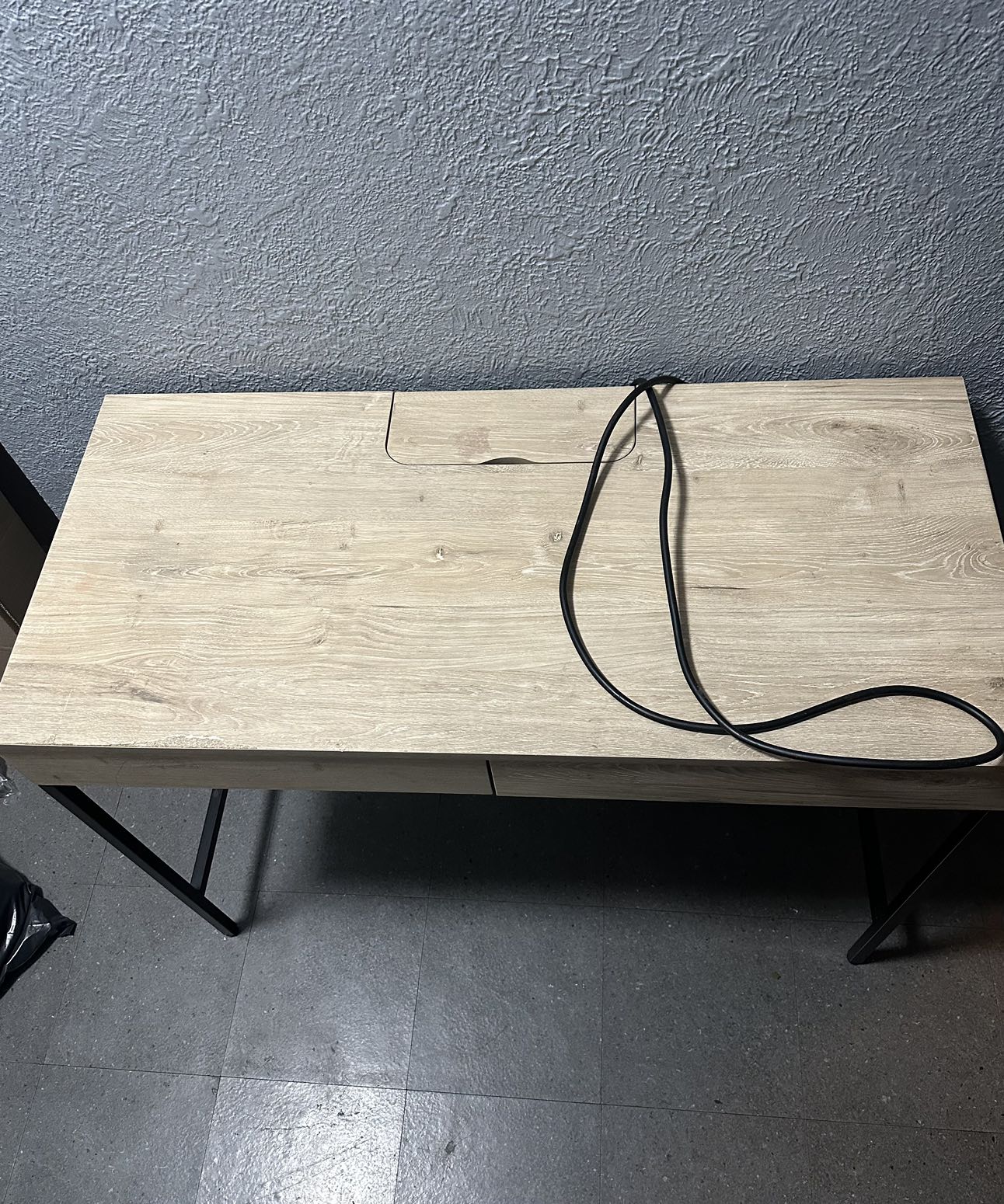 Desk with plug