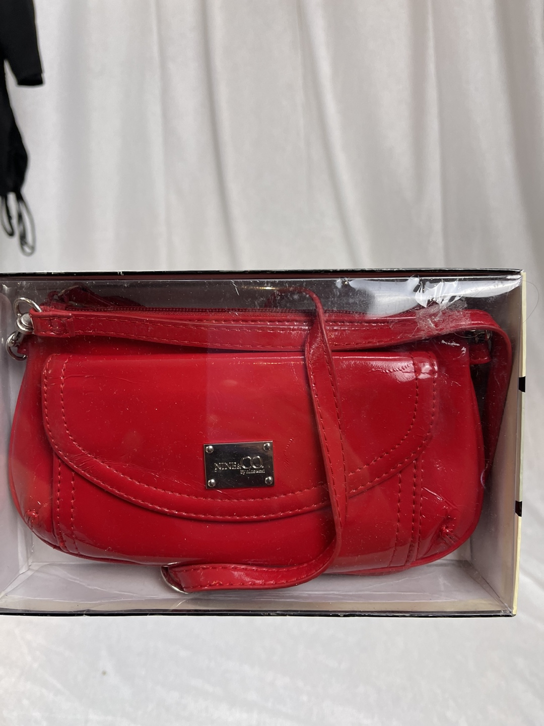 Red purse new in box