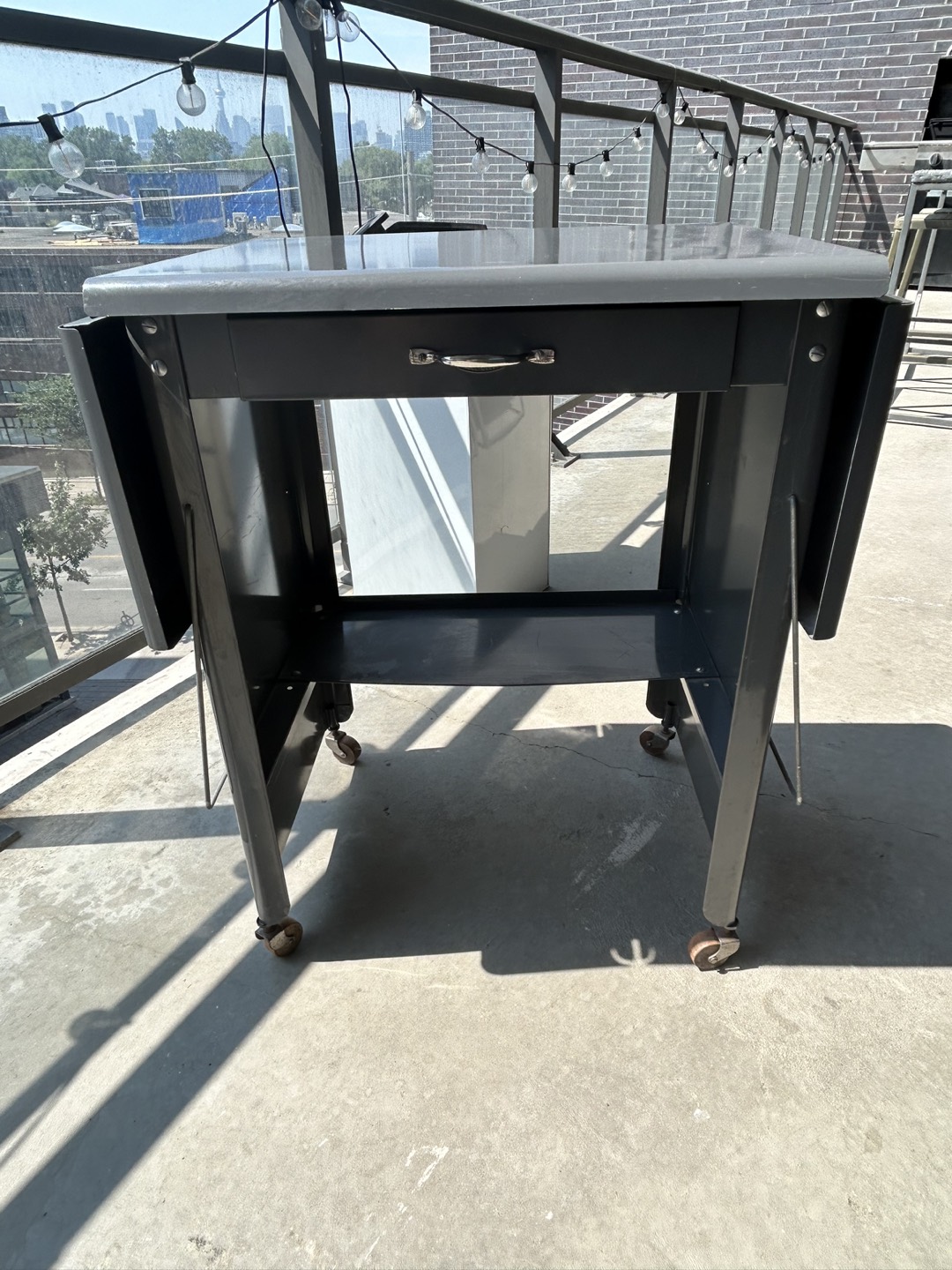 Small vintage metal utility table (with wings)