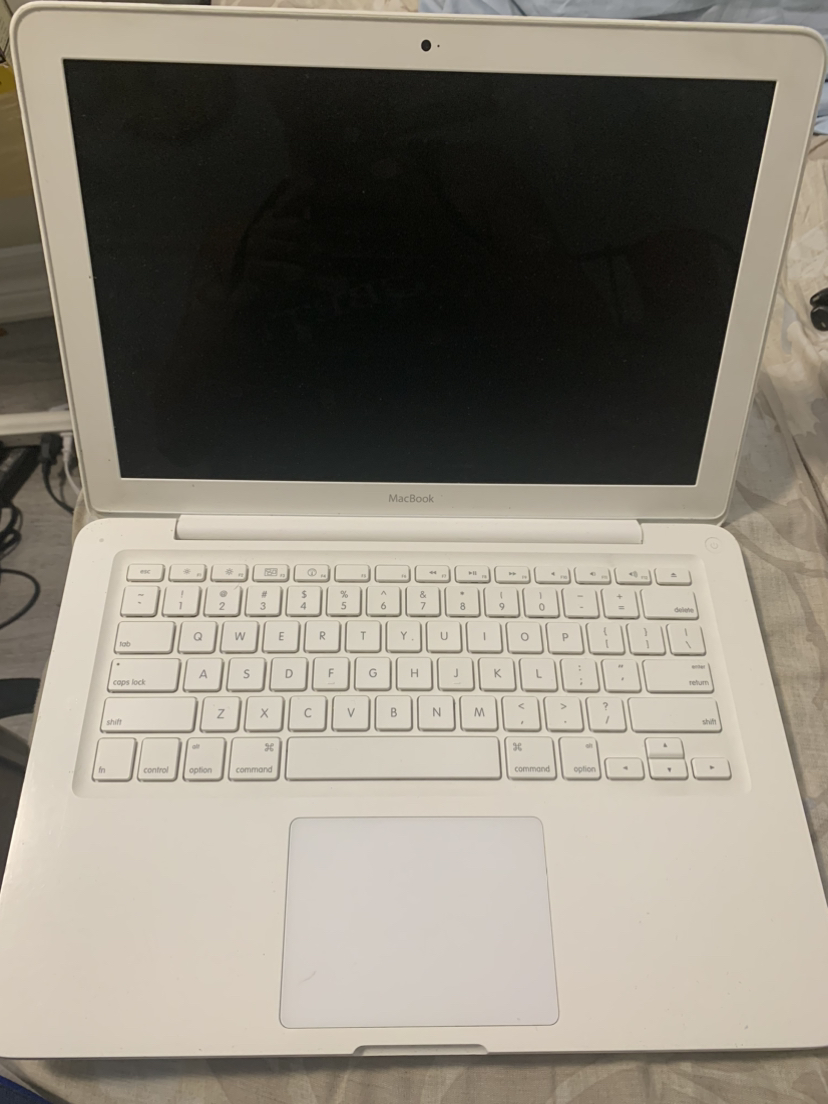 2010 mac book with new charger thumbnail