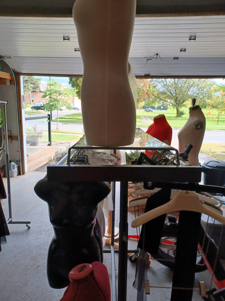 double retail clothing rack with shelf