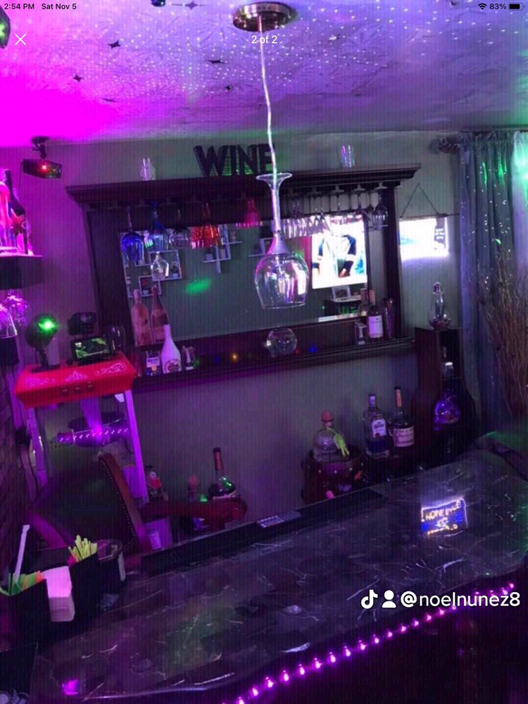 Bar table with chairs and mirror