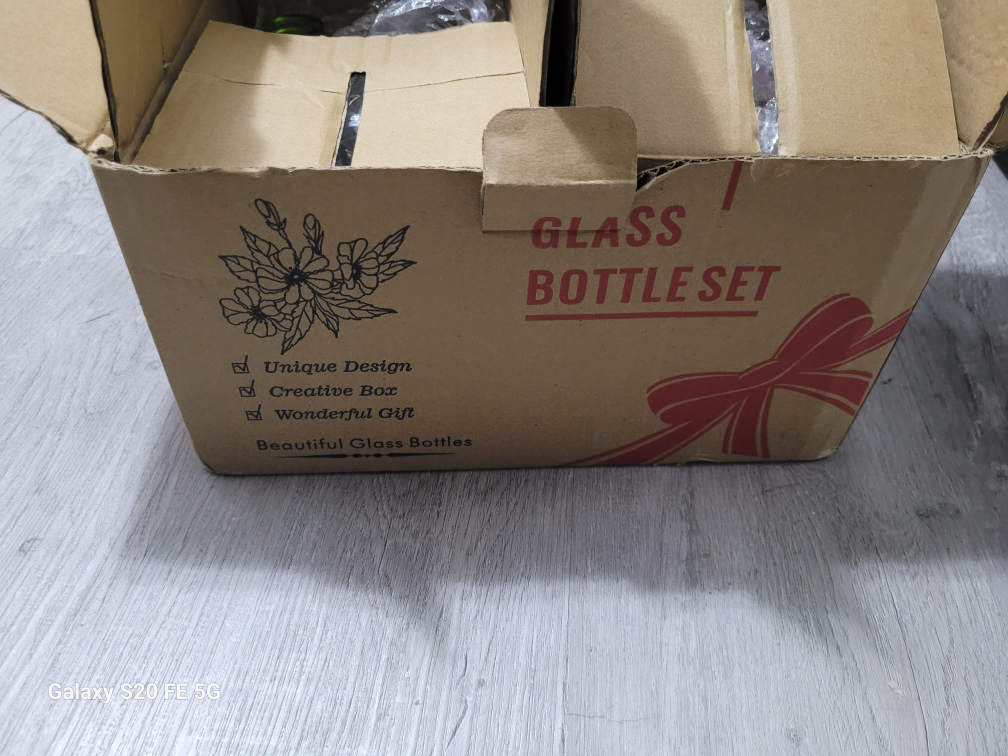 12 Beautiful Glass Bottles/Vases set🥕 image indicator(4)