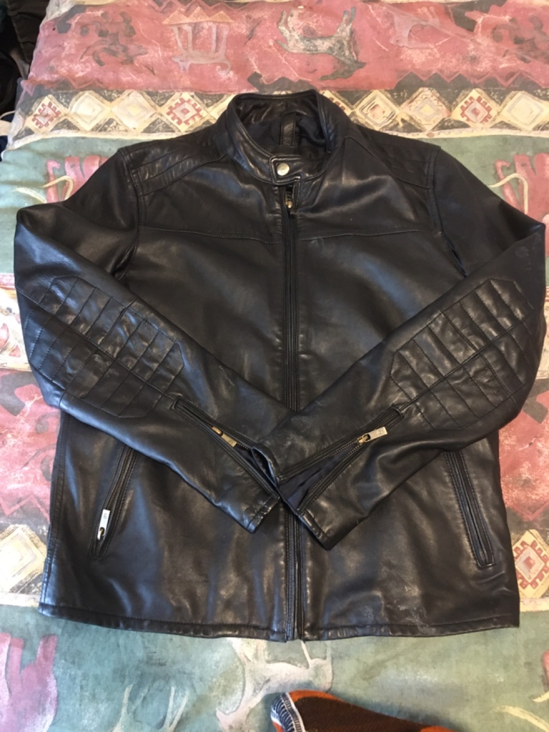 Motorcycle blk leather jacket.