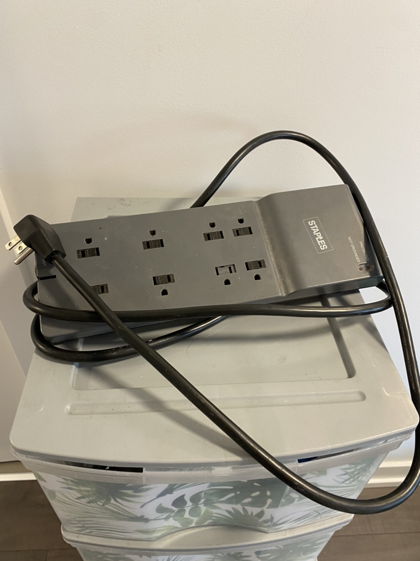 Extension cords, iPhone charger cable, extra plugs image indicator(2)