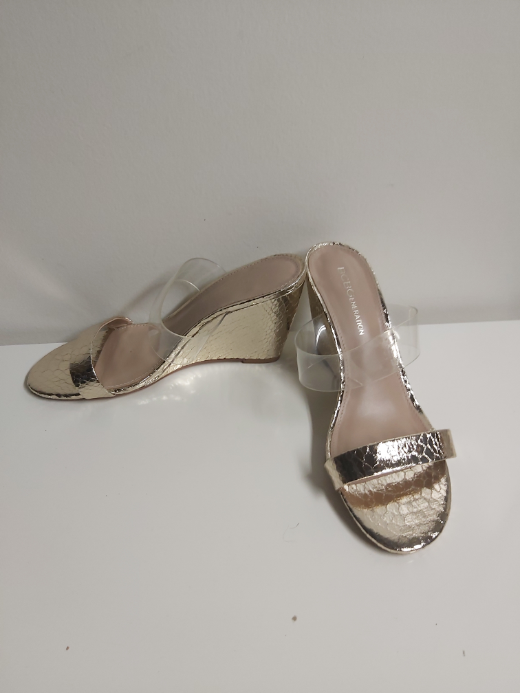 BCBGeneration gold and transparent wedges, size 7
