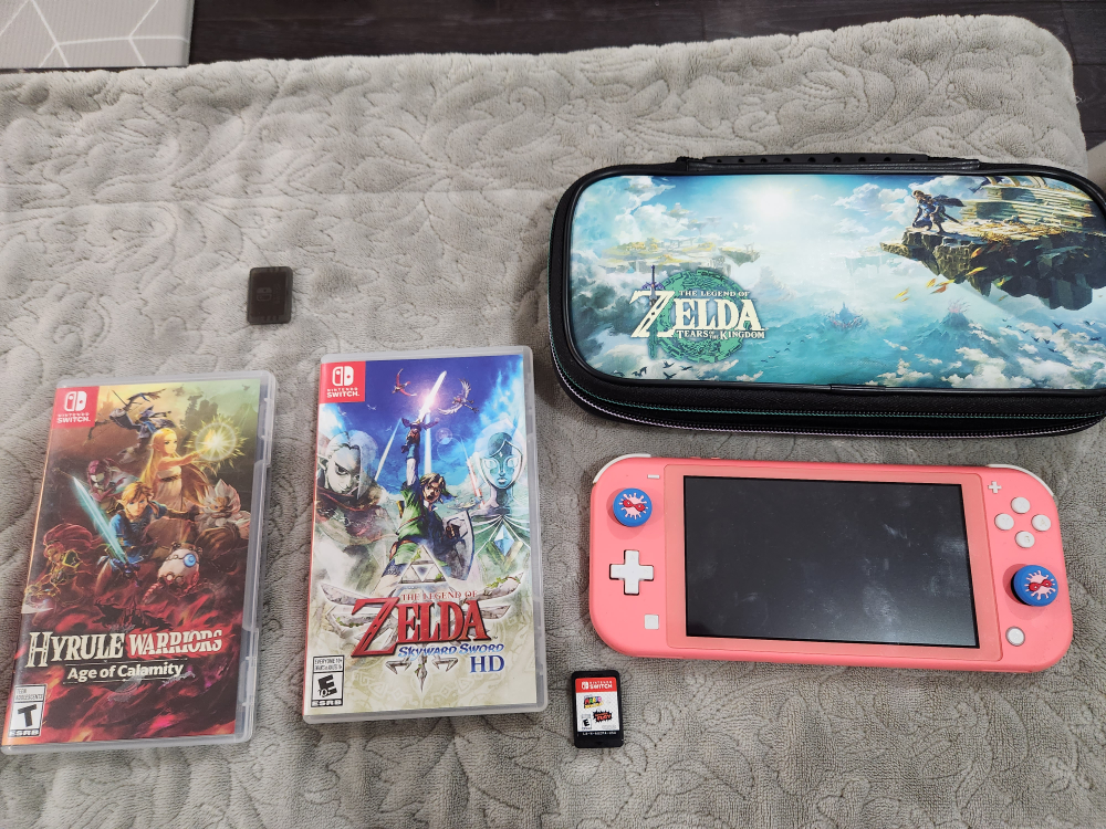 Switch lite Coral Bundle with 3 games