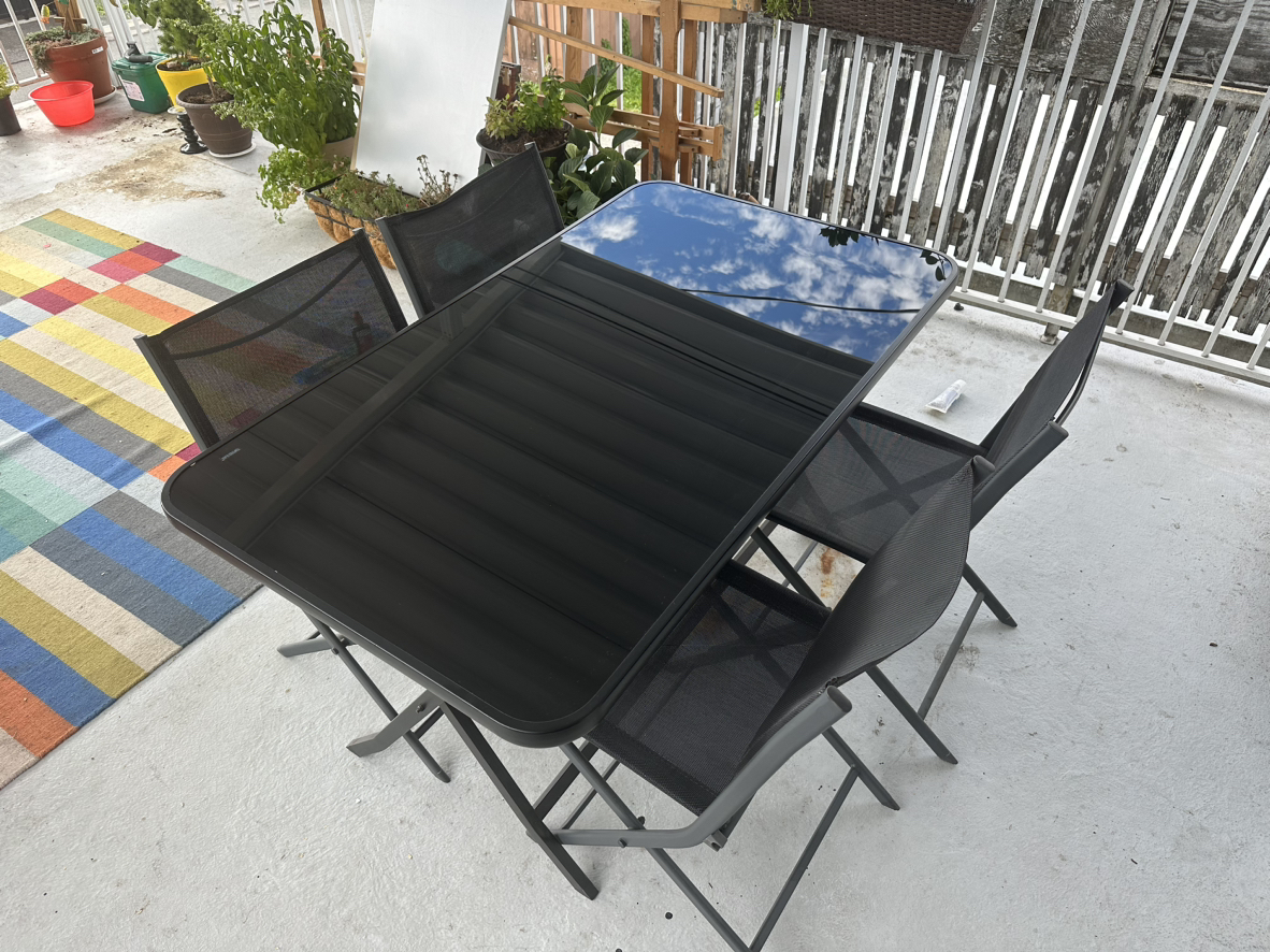 Black tempered glass patio table w 4 chairs