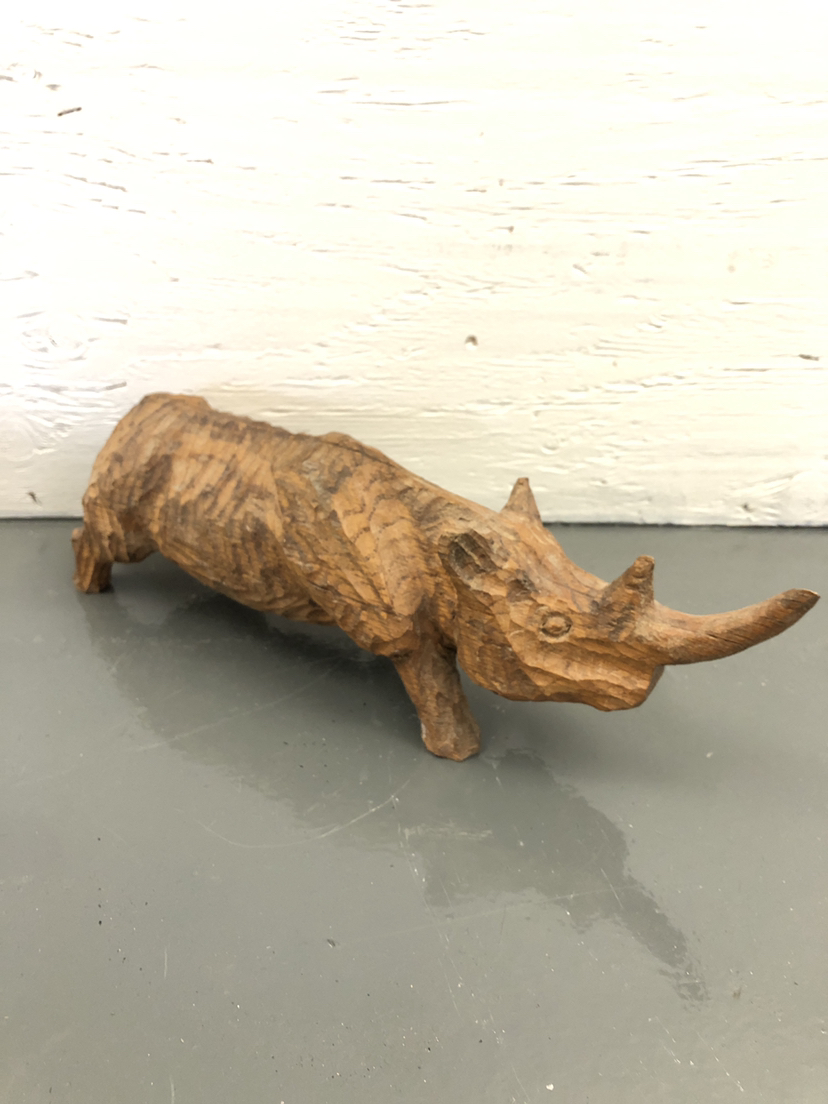 Wood rhino carving
