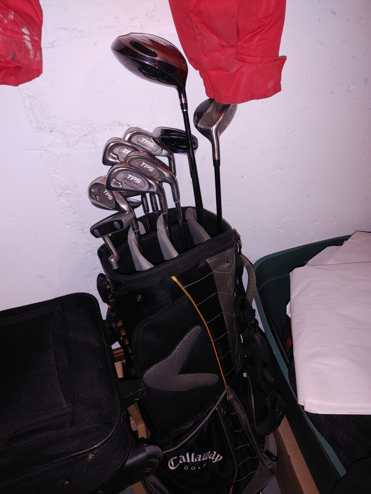 Assorted golf clubs