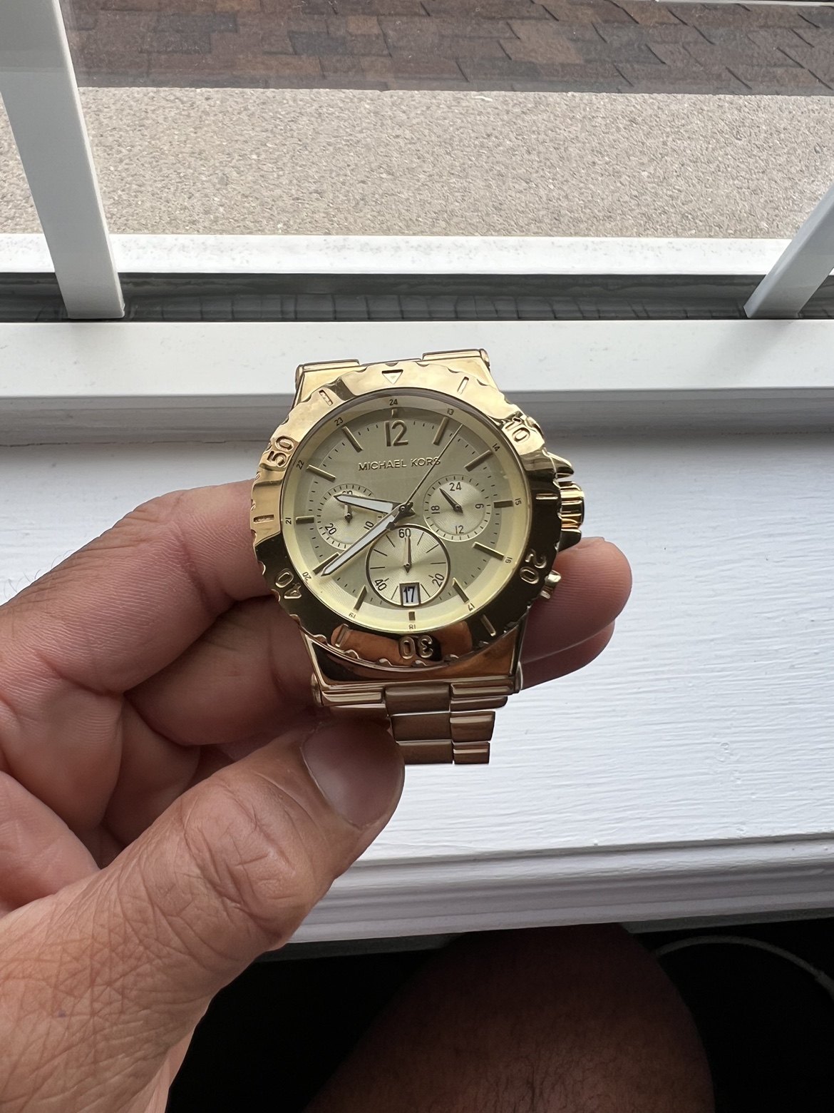 Gold Michael Kors watch unisex