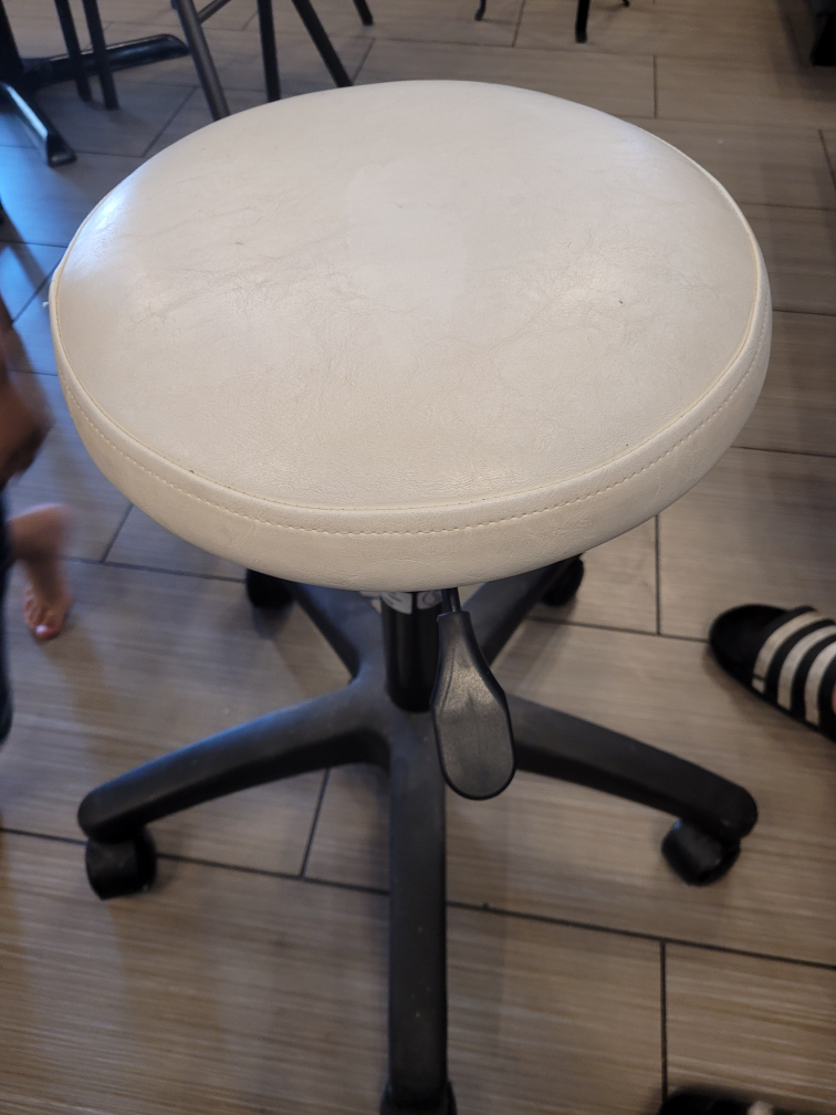 small spinning leather chair