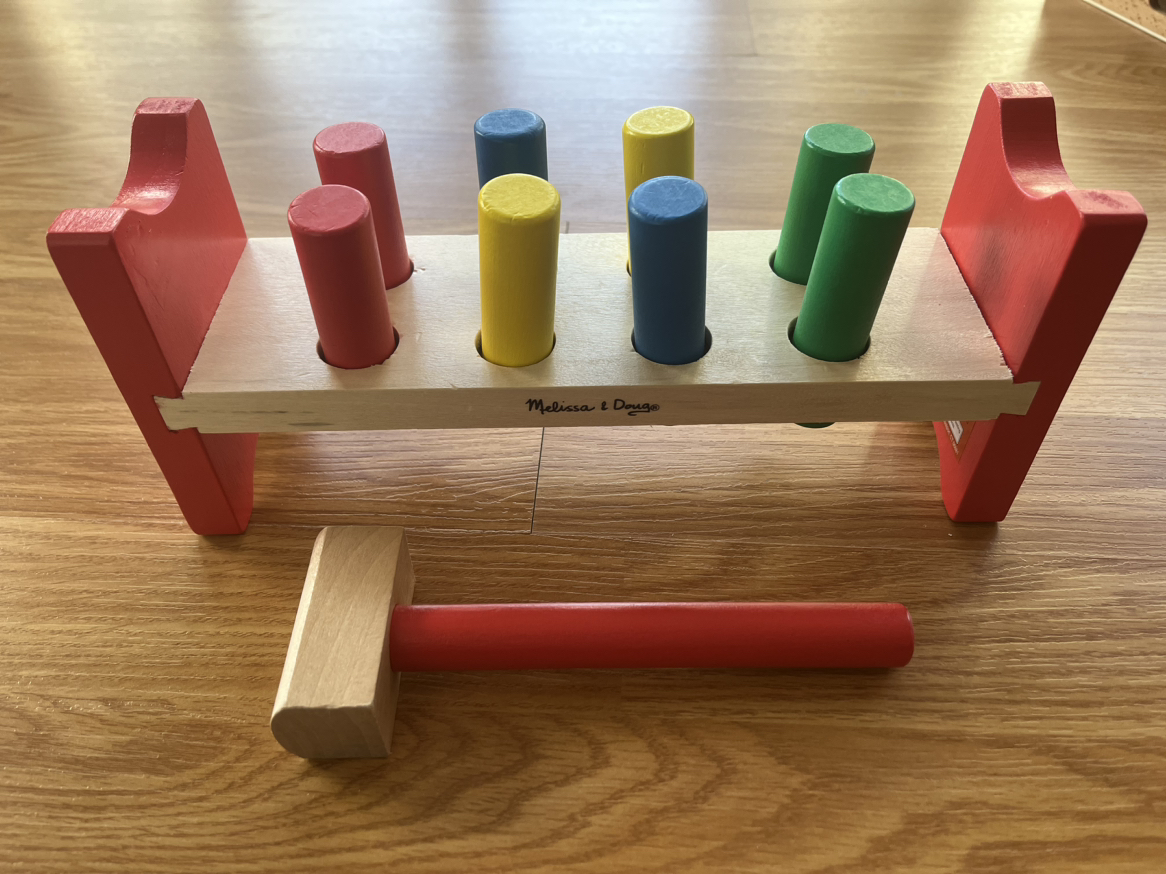 Melissa & Doug wooden pound a peg toy with hammer