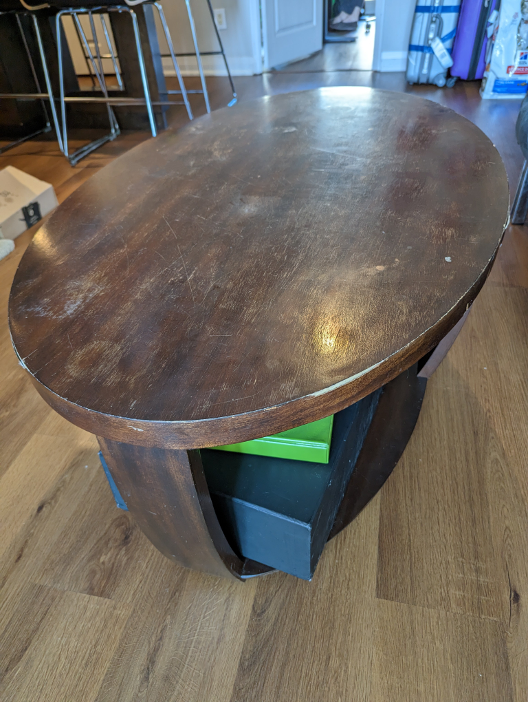 Wooden coffee table with wheels, oval-shaped - FREE thumbnail
