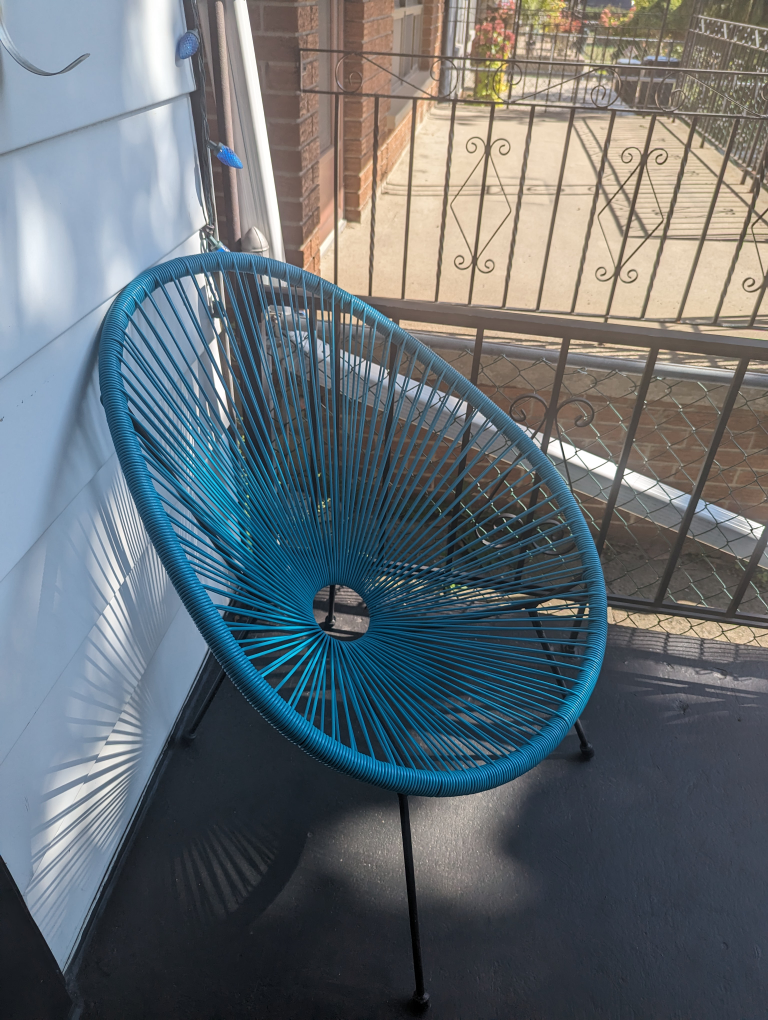 two blue patio chairs