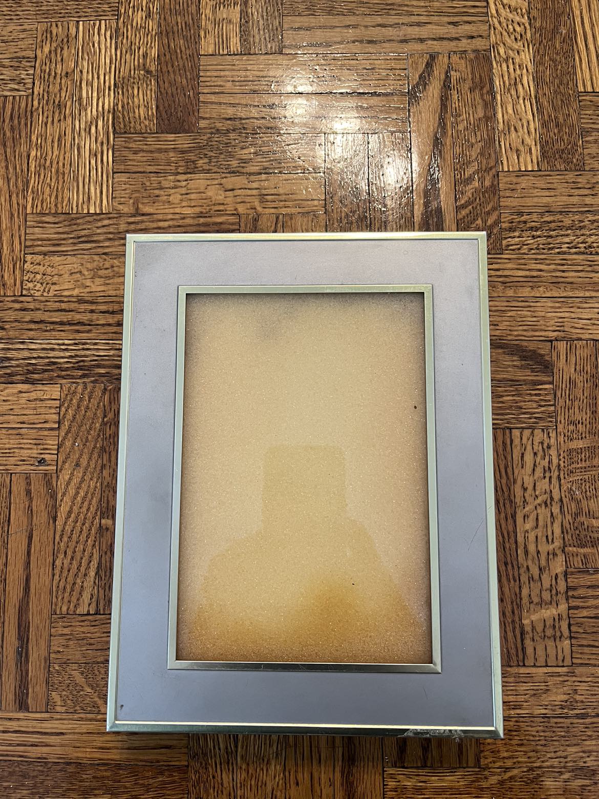 Photo frame with mini album thumbnail